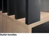 A close-up view of a wooden shelf with black vertical slats. Produktbild-Vorschau