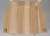 A close-up view of the back of a wooden chair. Voir les images du produit