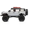 A remote-controlled car, specifically a white Ford Bronco, is shown in a studio setting against a white background. Podgląd zdjęcia produktu