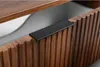Close-up of a dark brown wooden drawer with a black handle. Náhled obrázku produktu