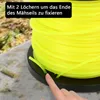 A close-up of a spool of yellow trimmer line with a hand pointing to the spool. Voir les images du produit
