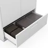 A white metal cabinet with an open drawer revealing storage boxes. Podgląd zdjęcia produktu