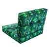 A two-piece cushion set for an outdoor chair, featuring a tropical leaf pattern. Náhľad obrázku produktu