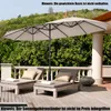 A patio scene with lounge chairs and a large umbrella. Anteprima dell’immagine prodotto