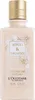 A bottle of L'Occitane body milk with floral design. Produktbild-Vorschau