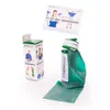 A Theraband exercise band and its packaging are displayed against a white background. Produktbild-Vorschau