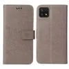 A flip cover phone case is shown from the front and back. Produktbild-Vorschau