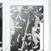 A window being cleaned with a squeegee and soapy water. Podgląd zdjęcia produktu