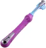 A dog toothbrush with a triple head and an ergonomic handle. Produktbild-Vorschau