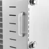 A close-up view of the side of a silver food dehydrator, showing the handle and ventilation slots. Podgląd zdjęcia produktu