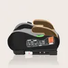 Side view of a gray and black child car seat booster with brown armrests, set against a plain light beige background. Náhled obrázku produktu