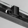 A close-up view of a shower door roller mechanism. Anteprima dell’immagine prodotto