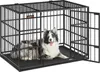A dog is lying inside a black metal dog crate with the door open. Produktbild-Vorschau