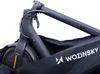 A close-up of an electric scooter's front wheel and handlebars, partially covered by a black storage bag. Produktbild-Vorschau