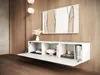 A modern living room with a wall-mounted TV lowboard. Voir les images du produit