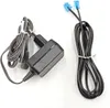 A black AC adapter with gray coiled wire and two blue RJ11 connectors with black wires on a white background. Podgląd zdjęcia produktu