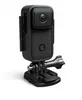 A black action camera with a mounting bracket is shown against a white background. Produktbild-Vorschau