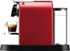 Side view of a red Nespresso coffee machine with a cup of espresso and a water tank. Anteprima dell’immagine prodotto