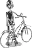 A metallic figurine of a person with a bicycle. Náhľad obrázku produktu