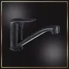 A black faucet is shown against a dark, gradient background. Anteprima dell’immagine prodotto