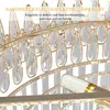 A close-up view of a crystal chandelier with gold accents, showing the nanometer electroplating lamp body and its exquisite details. Produktbild-Vorschau
