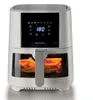 A white air fryer with a digital display and a window showing french fries. Náhľad obrázku produktu