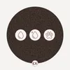 A dark, textured circle with three icons and a logo at the bottom. Náhled obrázku produktu