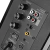 Close-up view of the back panel of a speaker, showing various ports, knobs, and a power switch. Produktbild-Vorschau