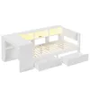 A white daybed with drawers and storage shelves, illuminated by LED lights. Náhľad obrázku produktu