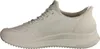 A side view of a white Skechers sneaker against a white background. Voir les images du produit