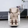 A massage chair is shown in a room with a sofa and a cabinet in the background. Produktbild-Vorschau