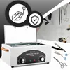 A high-temperature sterilizer with various beauty and grooming tools displayed around it. Voir les images du produit