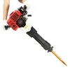 A person wearing white gloves is holding a red and black demolition hammer with an orange chisel. Náhled obrázku produktu