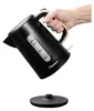 A hand holding a black electric kettle over its base. Anteprima dell’immagine prodotto
