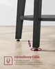 Close-up of the adjustable feet of a black table on a wooden floor. Produktbild-Vorschau