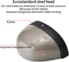 A close-up of a steel toe cap with labels indicating its materials and features. Produktbild-Vorschau