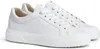 A pair of white leather sneakers on a white background. Produktbild-Vorschau