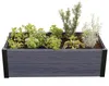 A raised garden bed filled with various herbs and plants, set against a white background. Náhľad obrázku produktu