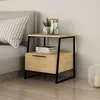 A modern nightstand with a drawer next to a bed. Podgląd zdjęcia produktu