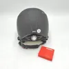 A black Alpina helmet is shown from the back on a white surface. Voir les images du produit