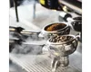 Glasbild 'Café II' mit Kaffeebohnen und Siebträger im Produktbild-Vorschau 1