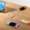 A charging station with multiple devices connected to it on a wooden desk. Produktbild-Vorschau
