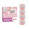 A product shot of Gillette Venus Comfortglide Spa Breeze women's razor blades and their packaging. Podgląd zdjęcia produktu