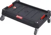 A black transport trolley with wheels and red accents, shown from a slightly elevated angle against a white background. Náhled obrázku produktu