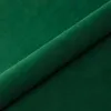 A close-up view of a roll of dark green velvet fabric. Náhľad obrázku produktu