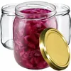 Three glass jars, one filled with red cabbage, and a gold lid are arranged on a white background. Anteprima dell’immagine prodotto
