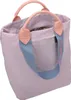 A lilac tote bag with pink handles and a blue strap. Produktbild-Vorschau