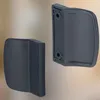Two dark gray door handles are shown against a blurred background. Náhľad obrázku produktu