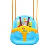 A blue baby swing with a yellow steering wheel and cartoon characters on the backrest, suspended by orange ropes against a white background. Produktbild-Vorschau