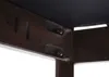 A close-up view of the underside of a wooden chair frame, showing how it is assembled with screws. Náhľad obrázku produktu